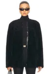 Totême Toteme Teddy Genuine Shearling Zip Jacket In Black