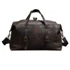 Touri Large Genuine Leather Holdall -worn Brown In Brown
