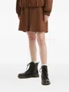 Tout A Coup Pleated Mini Skirt In Brown
