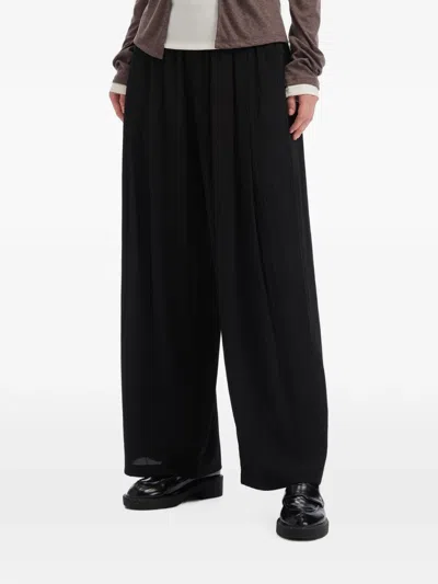 Tout A Coup Pleated Palazzo Pants In Black