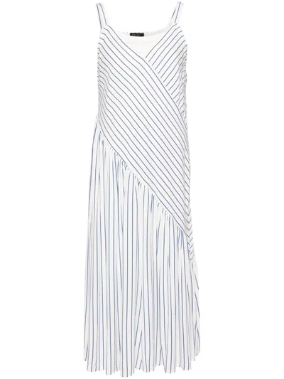 Tout A Coup Striped Poplin Jumpsuit In Blue