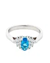 Traditions Jewelry Company Sterling Silver Blue Topaz Ring With Cubic Zircon Accent In White