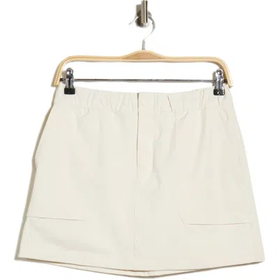 Travismathew Diana Performance Cargo Miniskirt In Vanilla Ice