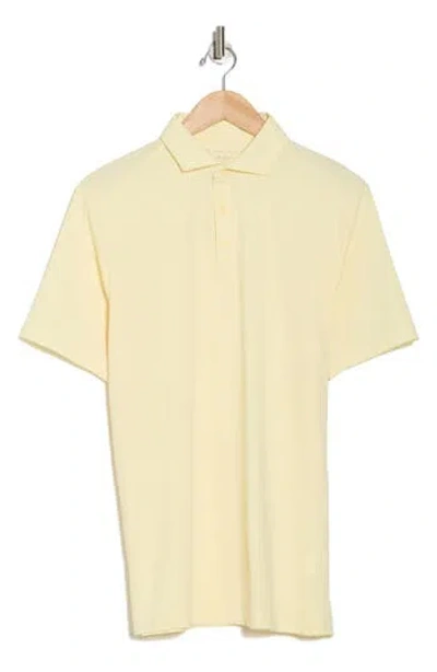 Travismathew Heater Pro Stretch Knit Polo In French Vanilla