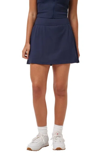 Travismathew Move Knit Game Set Match Skort In Blue