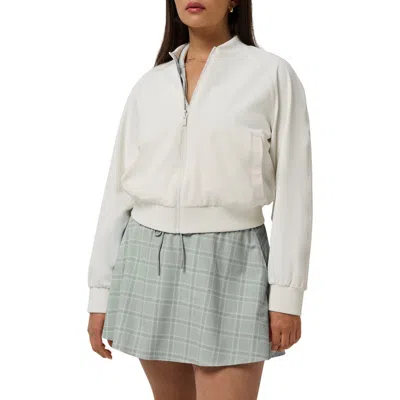 Travismathew Opening Shot Performance Reversible Bomber Jacket In Snow White