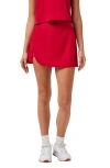 Travismathew Shifting Sands Golf Skort In Red