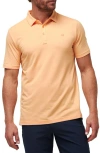 Travismathew The Heater Solid Short Sleeve Performance Polo In Apricot