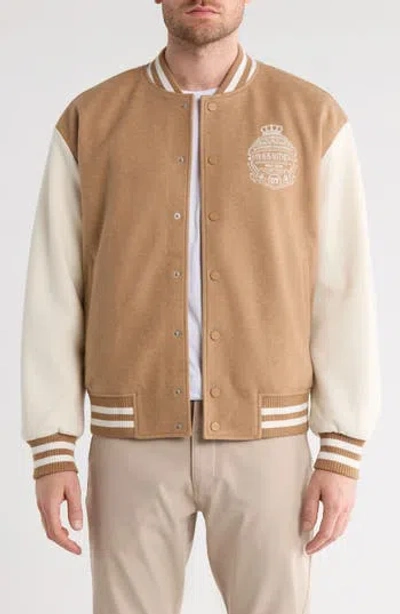 Travismathew Victory Mile Varsity Jacket In Gold
