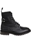 Tricker's Rugged Black Leather Boots With Brogue Detailing In Black