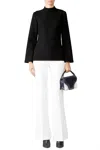 Trina Turk Hostess Top In Black In Black