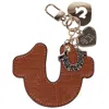 True Religion Embossed Horseshoe Bag Charm In Brown