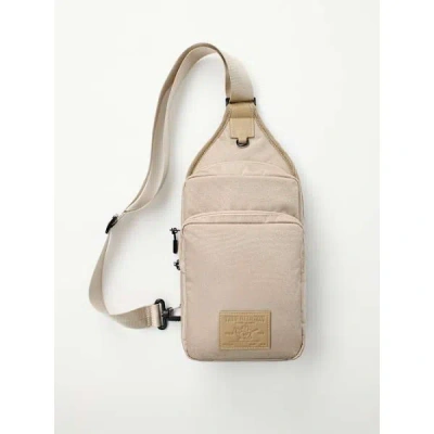 True Religion World Tour Patch Sling Bag In Brown