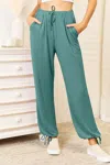Truedames Full Size Soft Rayon Drawstring Waist Pants With Pockets In Multi