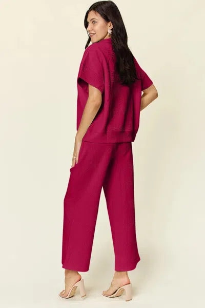 Truedames Full Size Texture Half Zip Short Sleeve Top And Pants Set In Pink