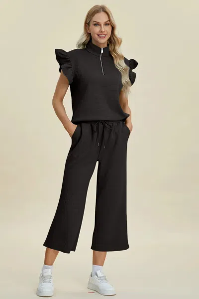 Truedames Full Size Texture Ruffle Short Sleeve Top And Wide Leg Pants Set In Black