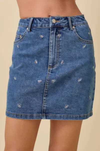 Truedames Mini Denim Skirt With All Over Ribbon Bow In Blue