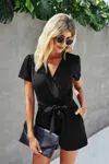Truedames Stretch Belted Plunge Neck Wrap Knot Side Romper In Black