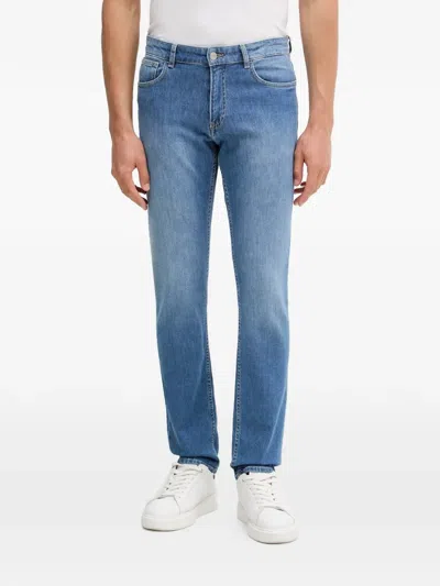 Trussardi Faded-effect Logo-patch Jeans In Blue