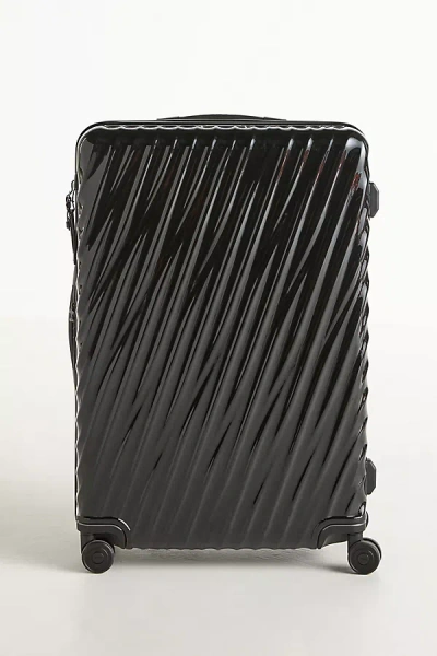Tumi Extended Trip Expandable 4 Wheeled Packing Case In Black