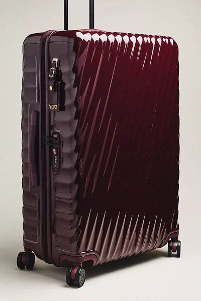 Tumi Extended Trip Expandable 4 Wheeled Packing Case In Red