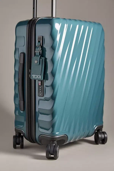 TUMI INTERNATIONAL CARRY-ON SUITCASE