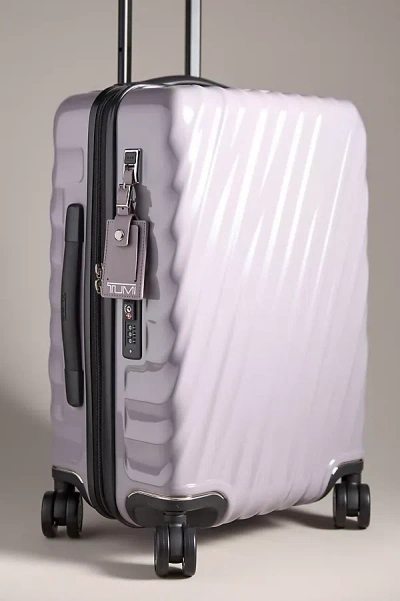 TUMI INTERNATIONAL CARRY-ON SUITCASE