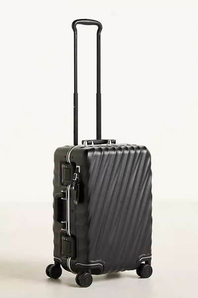 TUMI INTERNATIONAL CARRY-ON SUITCASE