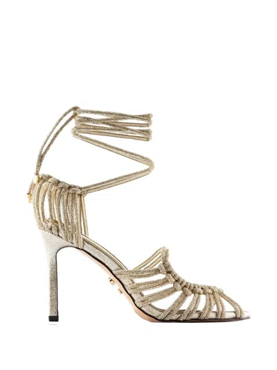 Twenty Four Haitch Molì Oro Strappy Sandals In Gold