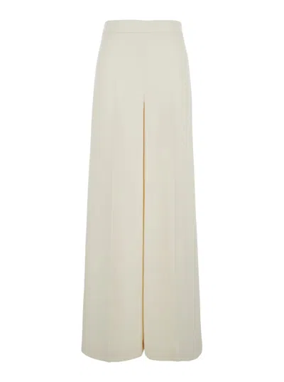 TWINSET BEIGE PANTS WITH LOGO PENDANT AND SIDE ZIP CLOSURE IN TECH FABRIC WOMAN