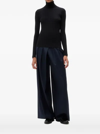 Twp Roll-neck Ribbed-knit Sweater In Black