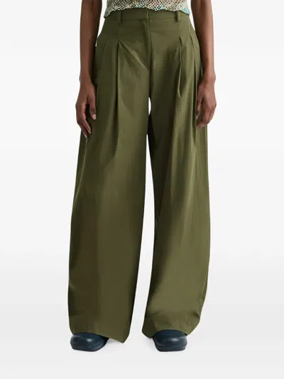 Twp The Next Didi Pleated Raw-hem Trousers In Black