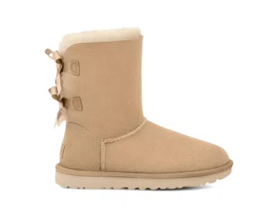 Pre-owned Ugg Bailey Bow Ii Boot (women's) Sneakers In Mustard Seed In Yellow