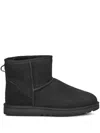 Ugg 'classic Mini' Black Ankle Boots With Logo Patch On The Rear And Shearling Lining In Suede Man In Black