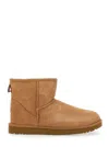 Ugg Classic Mini Brown Ankle Boots With Logo Patch On The Rear And Shearling Lining In Suede Man In Brown