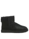 Ugg 'classic Mini' Black Ankle Boots With Logo Patch On The Rear And Shearling Lining In Suede Man In Black
