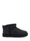 Ugg Classic Ultra Mini Black Ankle Boots With Shearling Lining In Leather Woman In Black