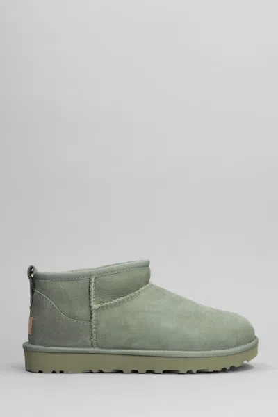 Ugg Classic Ultra Mini Low Heels Ankle Boots In Green Suede
