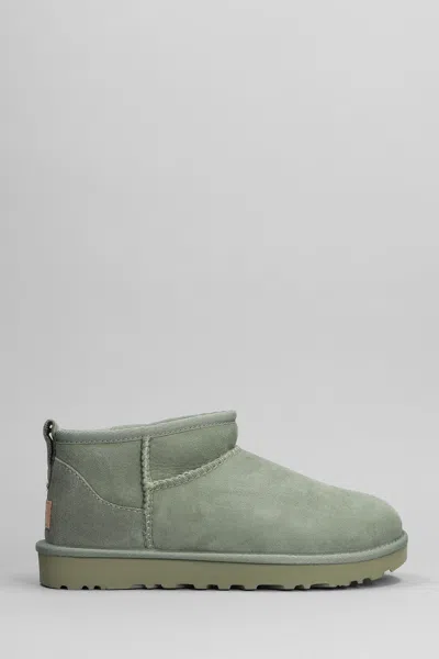 Ugg Classic Ultra Mini Low Heels Ankle Boots In Green Suede In Black