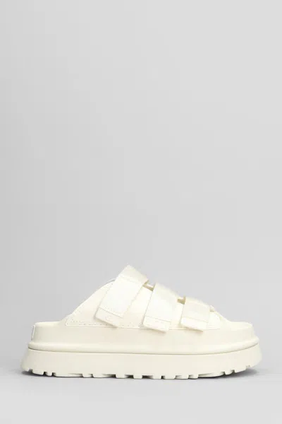 UGG UGG GOLDENGLOW SLIDE SLIPPER-MULE