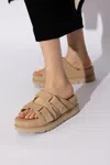 Ugg Goldenstar Hi Suede Slides In Beige