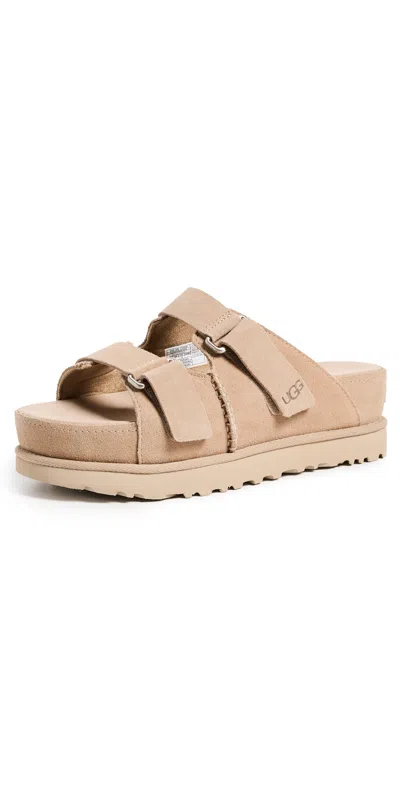 Ugg Women Goldenstar Hi Slide In Sand In Brown