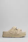 Ugg Goldenstar Hi Slipper-mule In Beige Suede