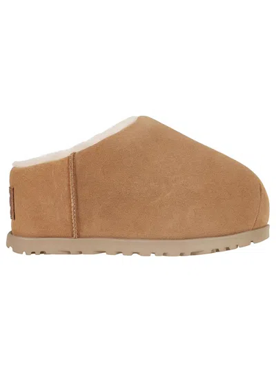 Ugg Luxurious Sheepskin Slippers With Plush Interior For Ultimate Comfort In Brown