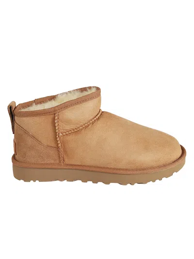 Ugg Luxury Mini Sheepskin Ankle Boots For Women In Brown