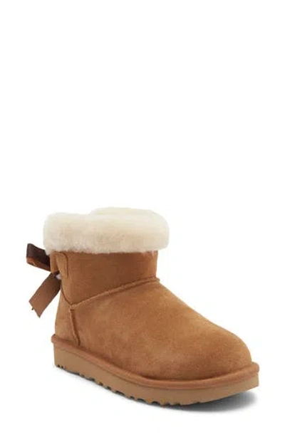 Ugg ® Mini Bailey Bow Faux Shearling Boot In Chestnut