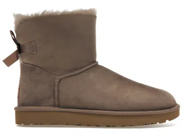 Pre-owned Ugg Mini Bailey Bow Ii Boot (women's) Sneakers In Caribou