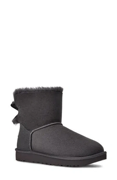 Ugg ® Mini Bailey Bow Ii Genuine Shearling Bootie In Obs