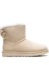 Ugg Mini Bailey Suede Bow "cream" Boots In 褐色