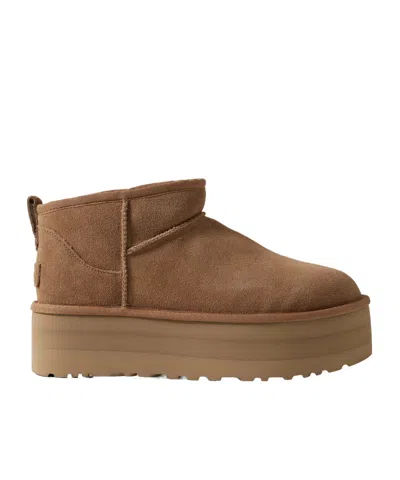 UGG MINI PLATFORM SHEARLING BOOTS